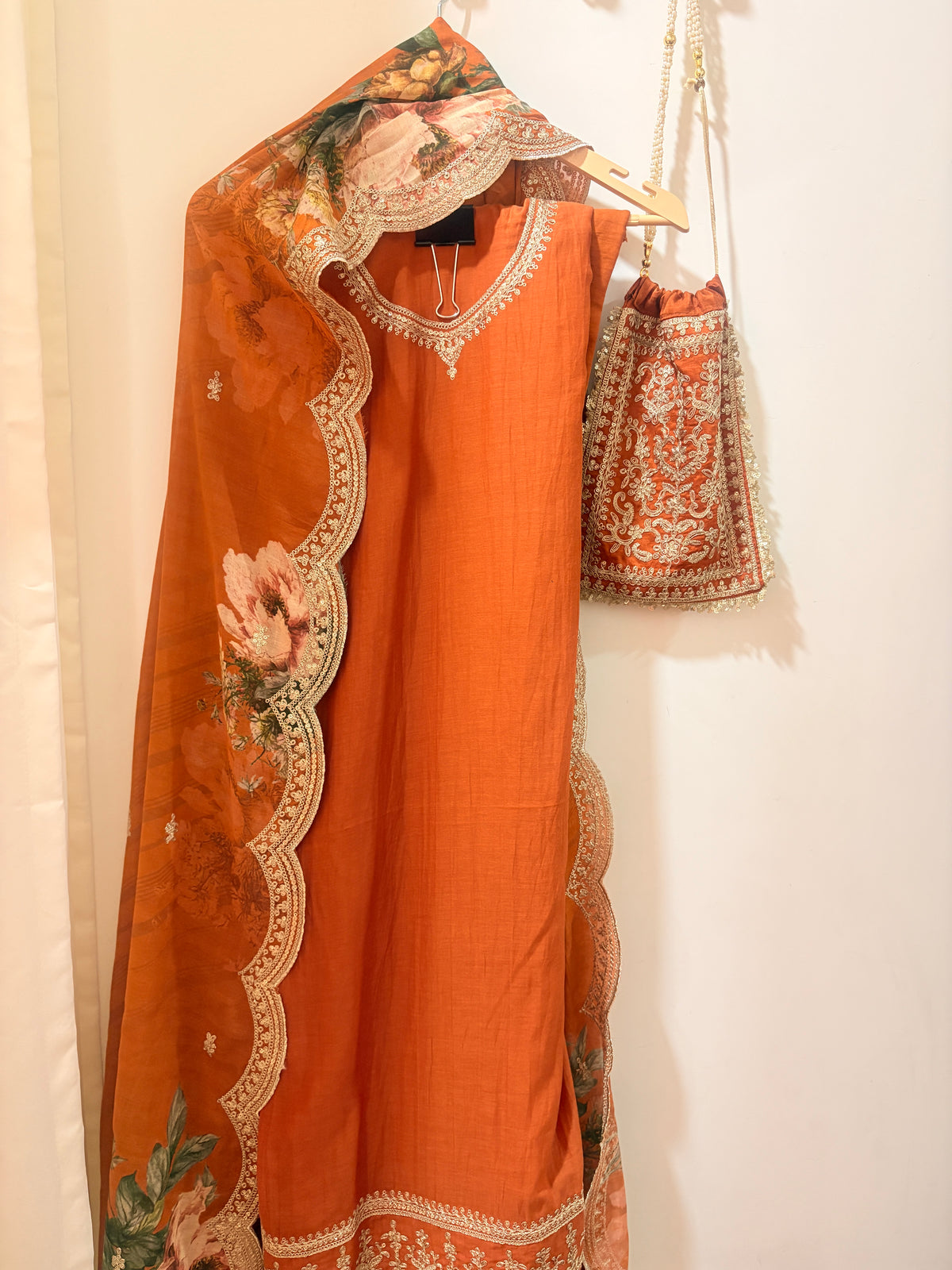 IdaraDesignsxHomake Mul Cotton Suit with embroidery and a Beautiful Matching Potli ( Rust Color, 4 Pc)